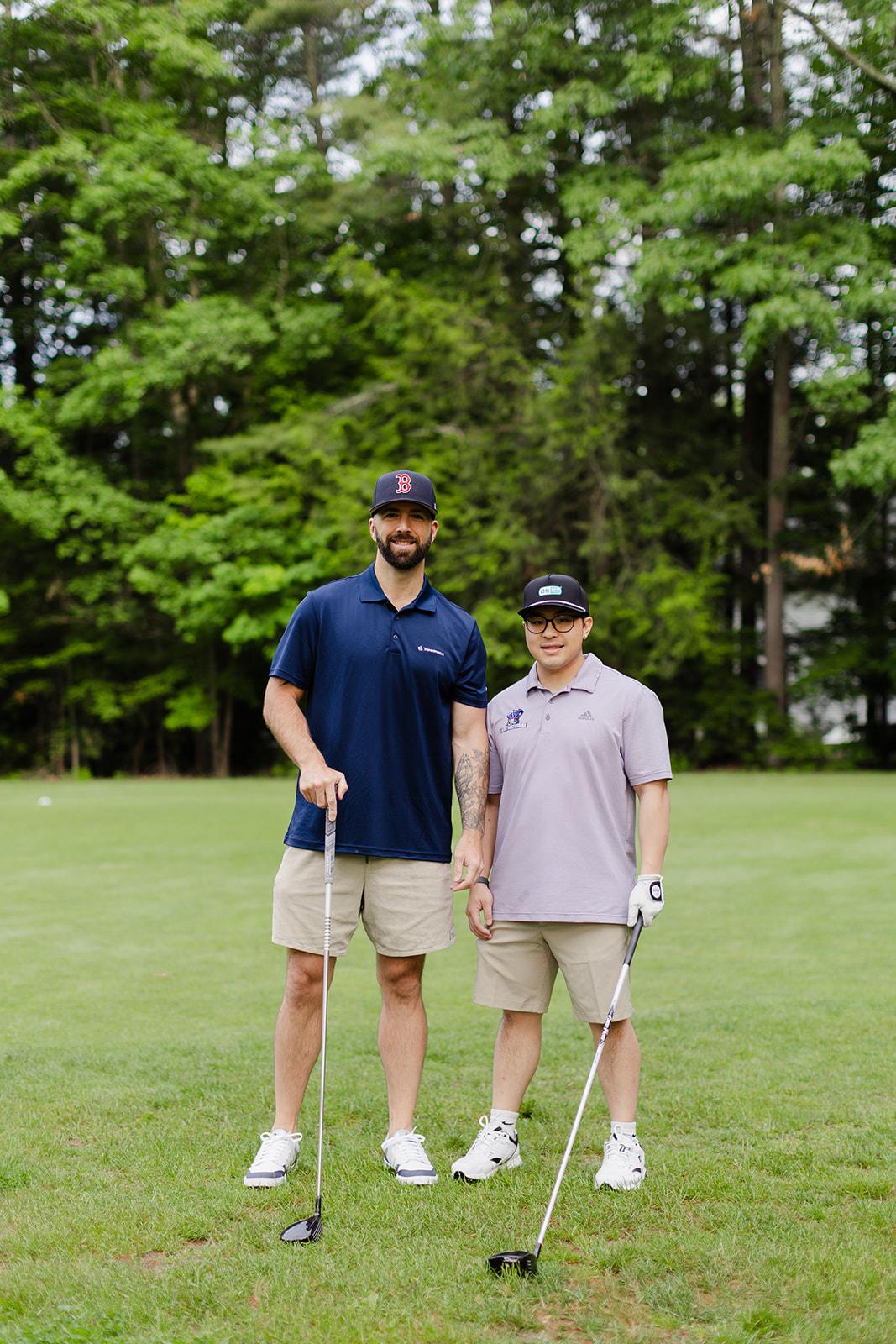 Two Patriot team members lining up their next shot together